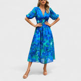 Clara – eleganta ziedu midi kleita