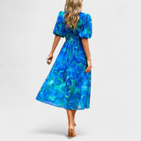 Clara – eleganta ziedu midi kleita