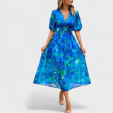 Clara – eleganta ziedu midi kleita