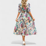 Clara – eleganta ziedu midi kleita